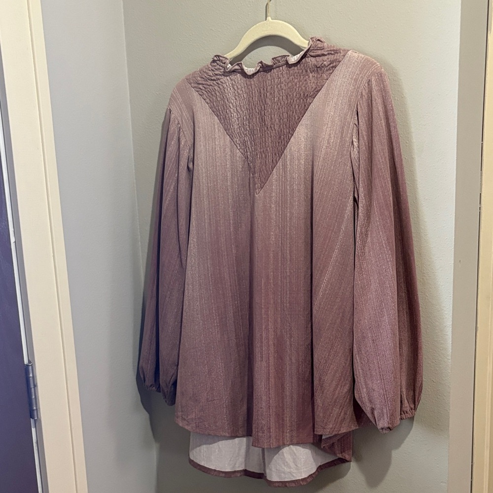 Elegance meets comfort in this New LuluRoe Long Sleeve Clara Blouse